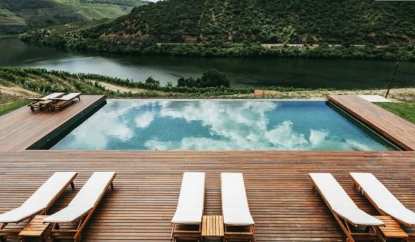 Poolside view at riverside hotel in the Douro Valley