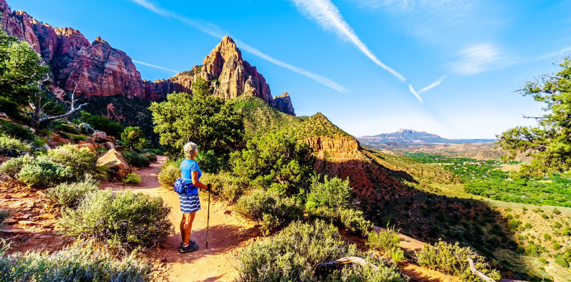 Explore Zion National Park, on foot at eye level, as you walk along a footpath with cinematic views.
