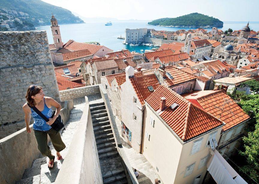 Europe Croatia tourist woman walking 