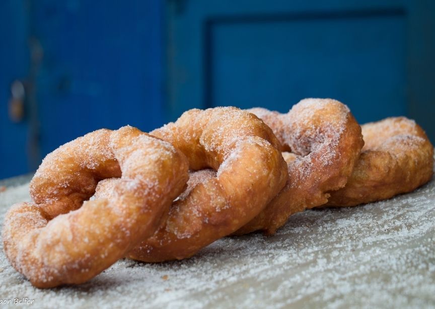 Moroccan sfenj doughnuts street food sprinkled with sugar
