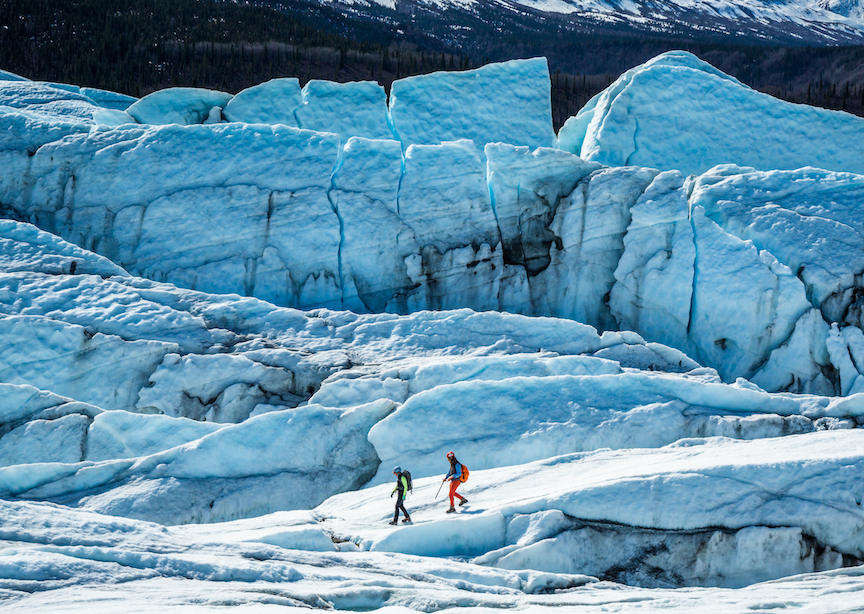 Man and woman on the Matanuska Glacier in Alaska