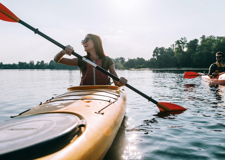 Female traveler kayaking 