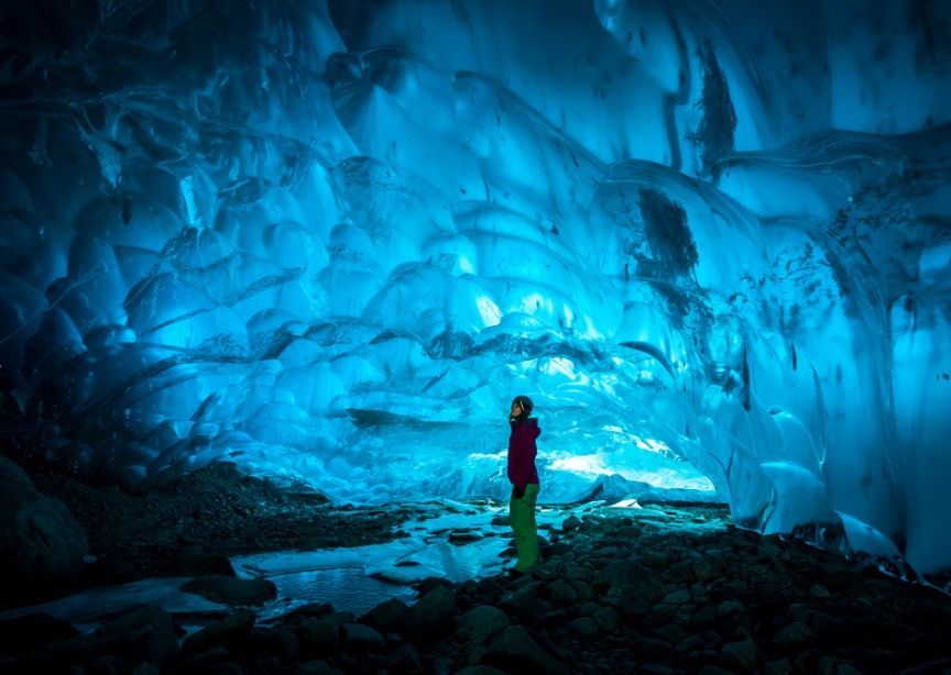 Iceland glacier ice cave blue traveler exploring