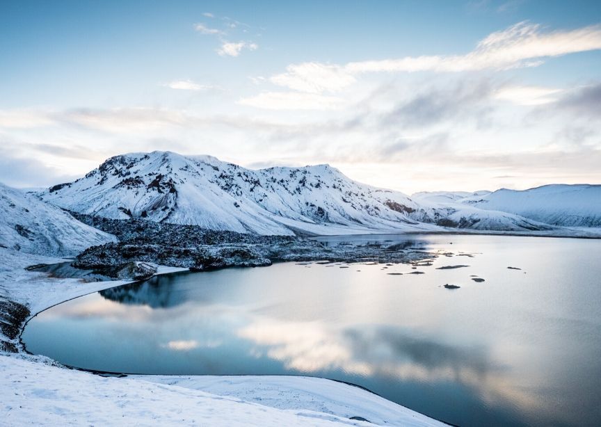 Iceland winter landscape snow on land and lake