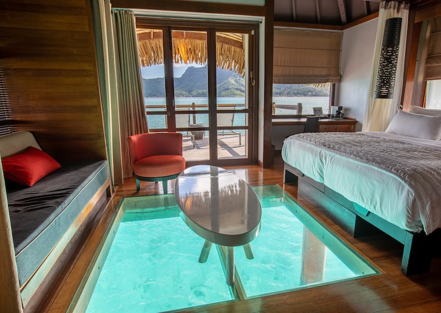 French Polynesia islands Bora Bora overwater bungalow room glass floor desk