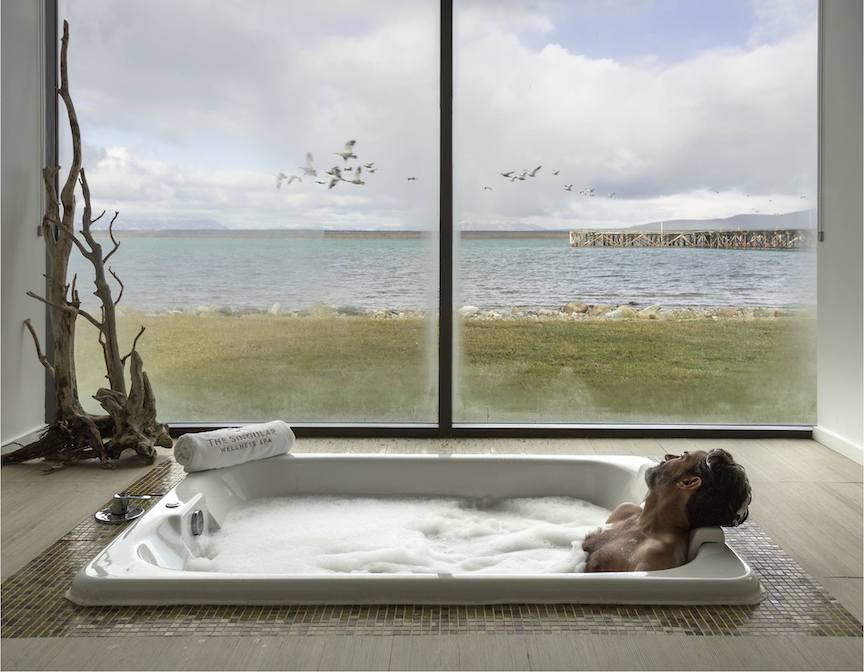 Man relaxing in Chile Singular Patagonia Luxury Hotel Bath