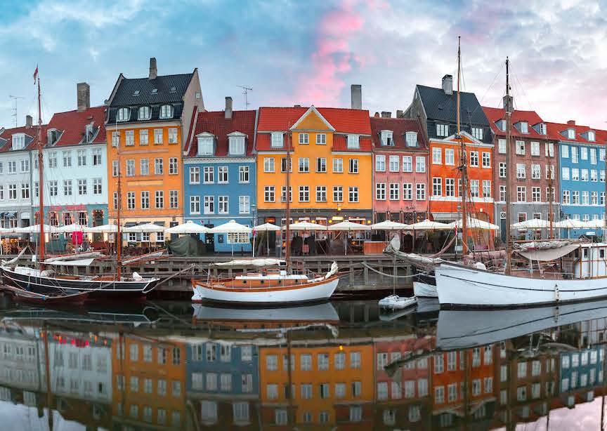 Denmark Copenhagen colorful street by canal