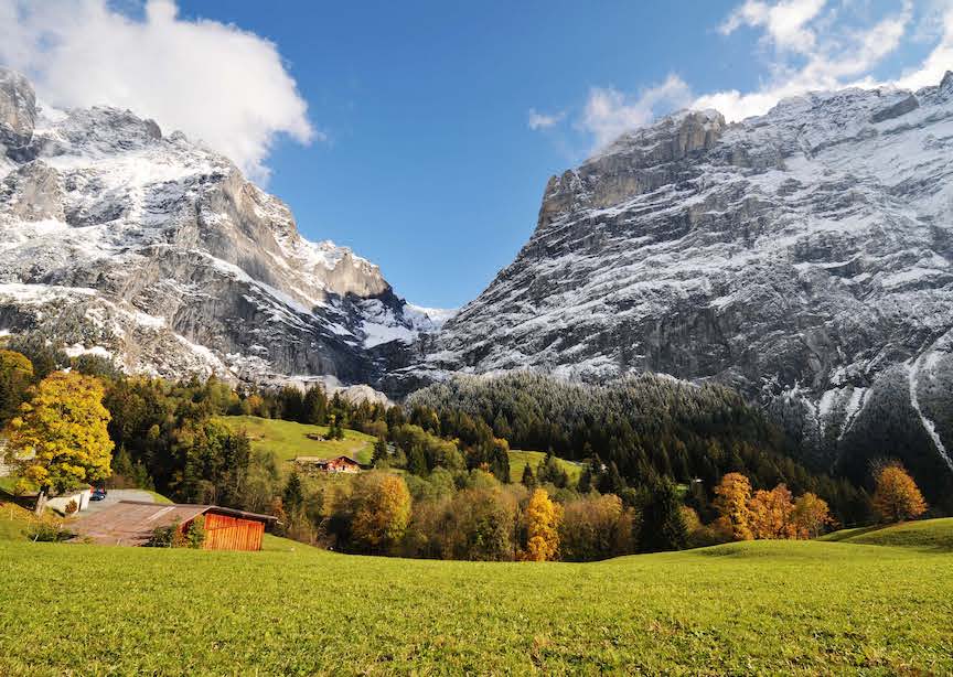 Switzerland Swiss alps mountain field and chalets