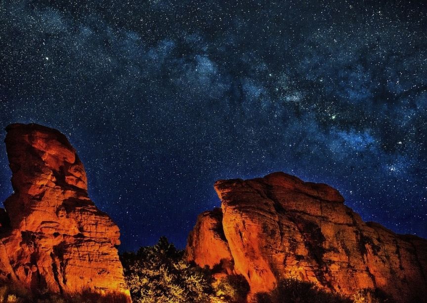 USA Grand Canyon red rocks at night with starry skies and Milky Way