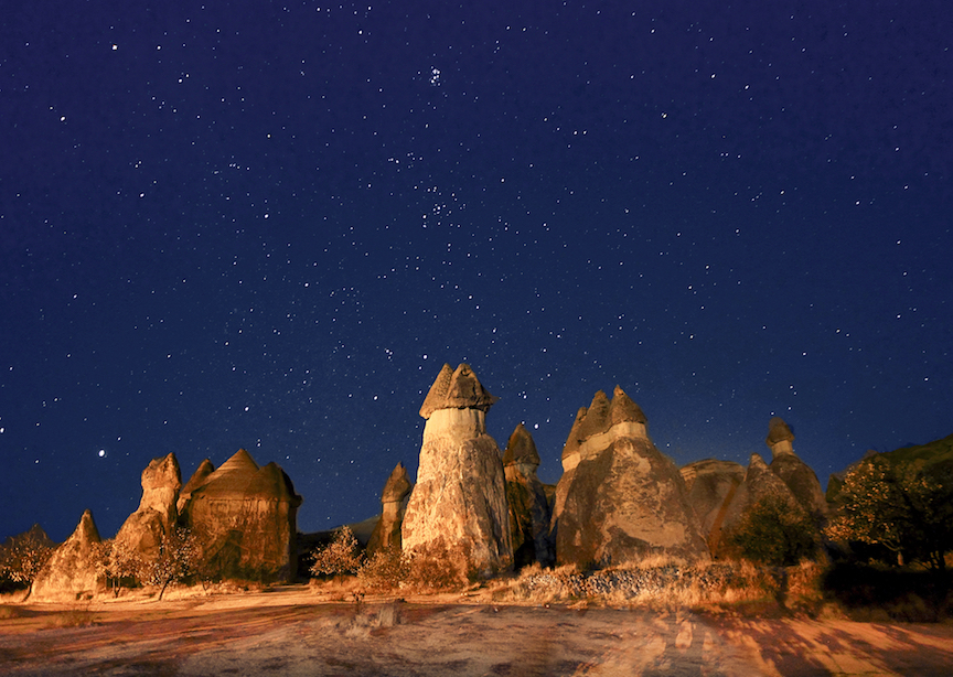 Europe Turkey Cappadocia Fairy Chimneys under starlit skies