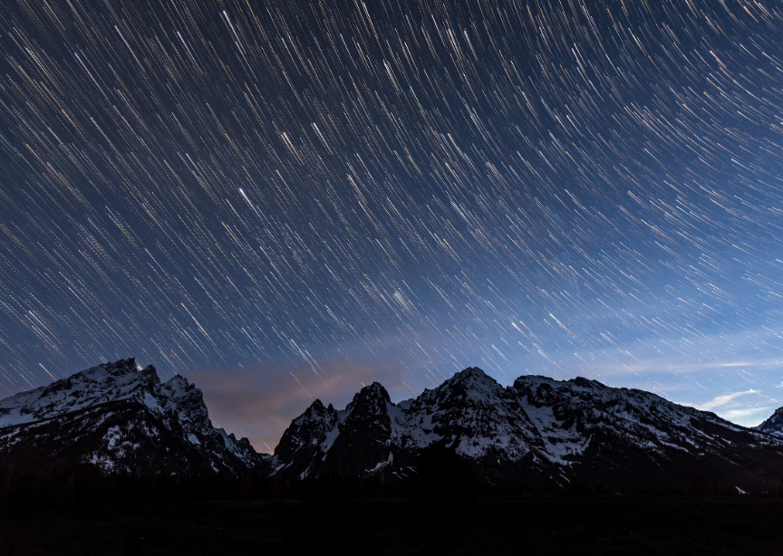 Wyoming Yellowstone Grand Teton Mountain Peaks with Starry Skies on Long Exposure Shot